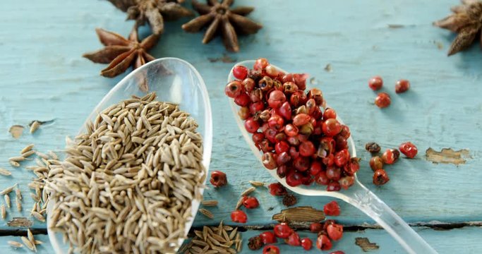 Various spices on wooden table 