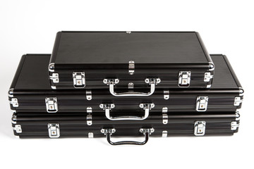 Black suitcases. Black suitcases with metal locks.