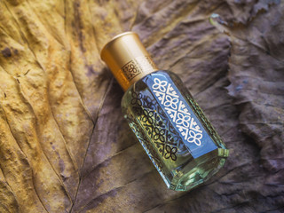 Arabian oud attar perfume or agarwood oil fragrances in mini bottle.
