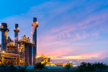 Fototapeta na wymiar Oil refinery, petroleum and energy plant at twilight with sky background. Industry Concept.