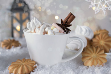 Holiday cup of  cocoa with marshmallow or coffee with spice and home cookies. Christmas background.
