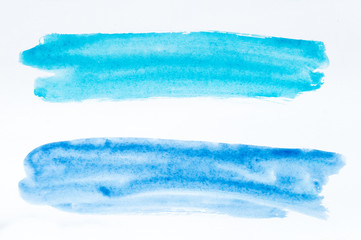 Set of watercolor brush strokes of blue and azure paint on white background. Watercolor abstract texture