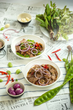Stir Fried Pork with Shrimp Paste and bitter bean, Thai Food isolated on white background