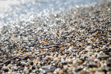 Sea stones on the seashore in the summer