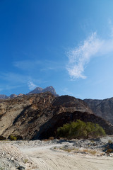 in oman  the old mountain gorge and canyon the deep cloudy  sky
