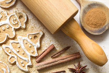 Fototapeta na wymiar Christmas homemade gingerbread cookies and cinnamon 