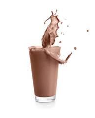 Glass with splashing cocoa, isolated on white