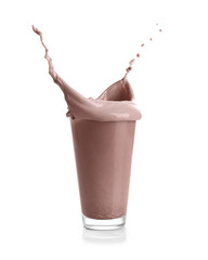 Glass with splashing cocoa, isolated on white