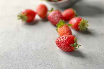 Fresh ripe strawberries on table, closeup
