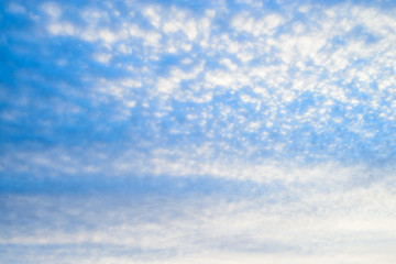 Fototapeta premium Beautiful blue sky with white fluffy clouds, texture. Nature weather background