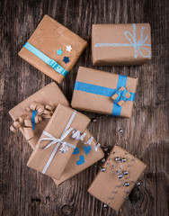 Vintage gift boxes with bow on wooden background