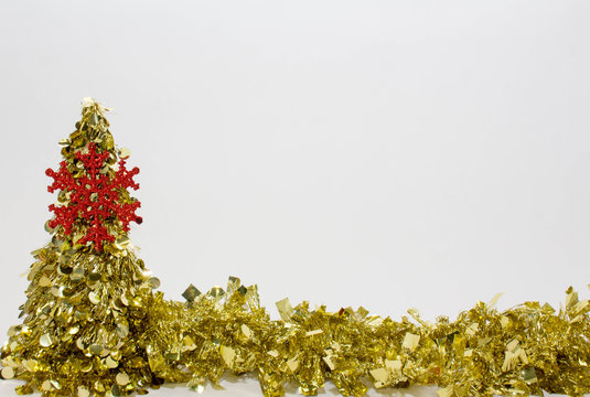 Golden Christmas Tree with Garland Border at Bottom 