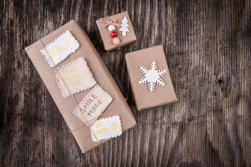 Obraz na płótnie Canvas Gift boxes package decorated for Christmas with New Year resolutions