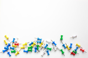 multicolored clerical buttons on a white background