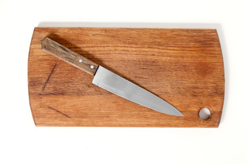 Design concept of mockup cutting board and knife set isolated on white background. Copyspace for text and logo. Clipping Path included on white background.