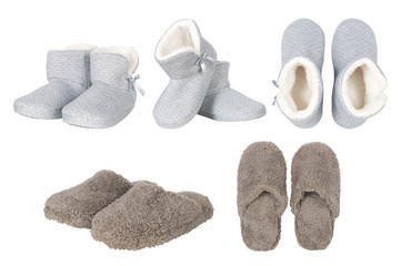 set of male and female slippers on white