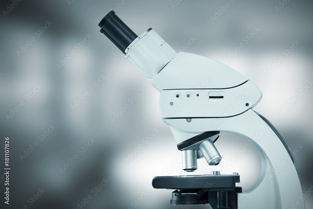 Poster composite image of microscope in laboratory