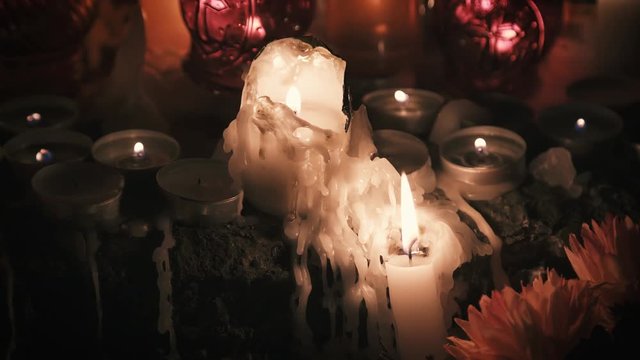 Burning candles on the day of the dead