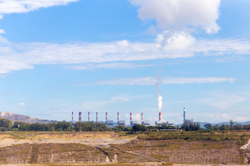 Fototapeta na wymiar Heavy industrial coal powered electricity plant
