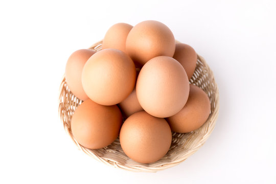 Top view Eggs in the basket on White Background