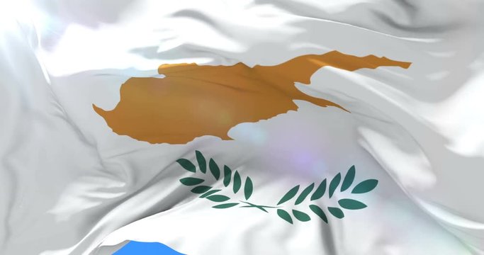 Cypriot flag waving at wind with blue sky, loop
