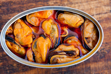 Canister of canned soused mussels