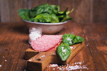 sausage with fresh spinach