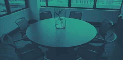 Empty meeting room with chairs and table