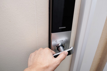 the hand touch on electronic key door