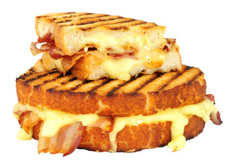 Brie cheese and pancetta meat toasted sandwich isolated on a white background