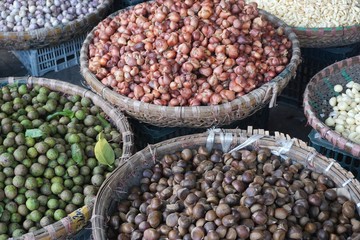 Baskets of fresh produce for sale at Hanoi market