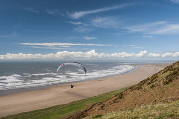 Hang gliding, Rossili, Gower, Wales, UK 