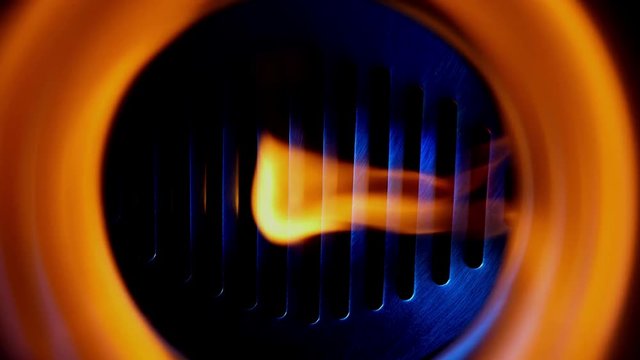 Ignition of gas in the thermal equipment. Close-up view.
