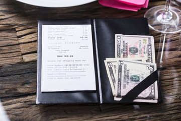 Elevated View Of Bill And Banknote