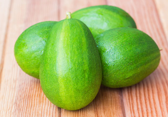 avocado on wooden table.