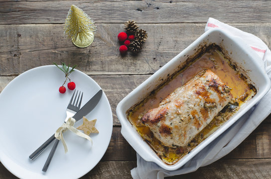 Baked meat with Christmas decoration.