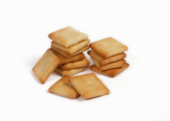 Fototapeta na wymiar salty crackers on a white background