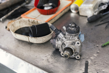 Obraz na płótnie Canvas fuel pump on repairs