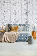 Grey boxes near king-size bed