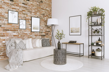 Living room with brick wall