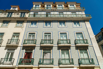 Fototapeta na wymiar Classic Apartment Building Block Exterior Facade In Lisbon, Portugal