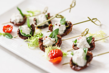 tasty canape with mozzarella