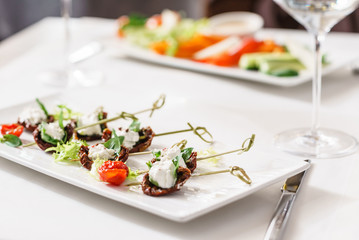 tasty canape with mozzarella