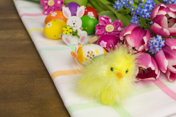 easter decoration with chick and tulips