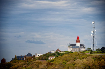 Fototapeta na wymiar Lighthouse of Ault, built on the cliff of Onival