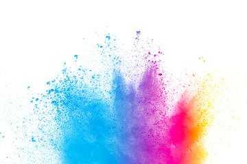 Abstract multicolored powder splatter on black background,Freeze motion of color powder splash....