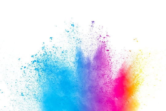 Abstract multicolored powder splatter on black background,Freeze motion of color powder splash. Color dust explosion on background.