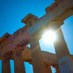 Foto auf Glas Sunlight through ancient columns © Roman Sigaev