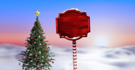 Wooden signpost in Christmas Winter landscape with Christmas