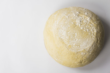 dough with close-up. man is preparing bread dough